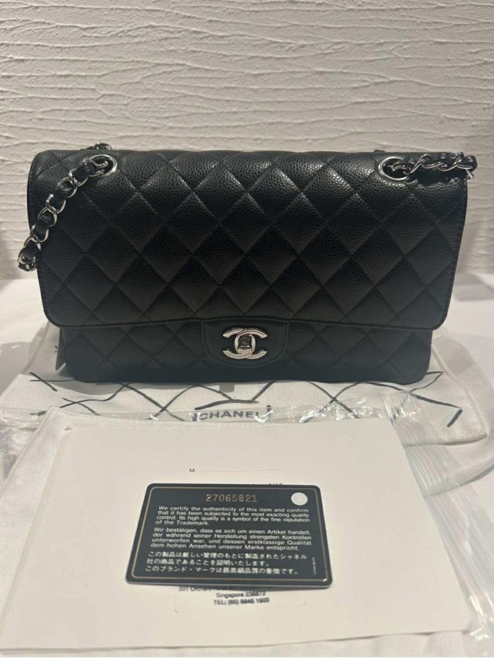 CHANEL Black Quilted Flap Shoulder Bag with Silver Hardware